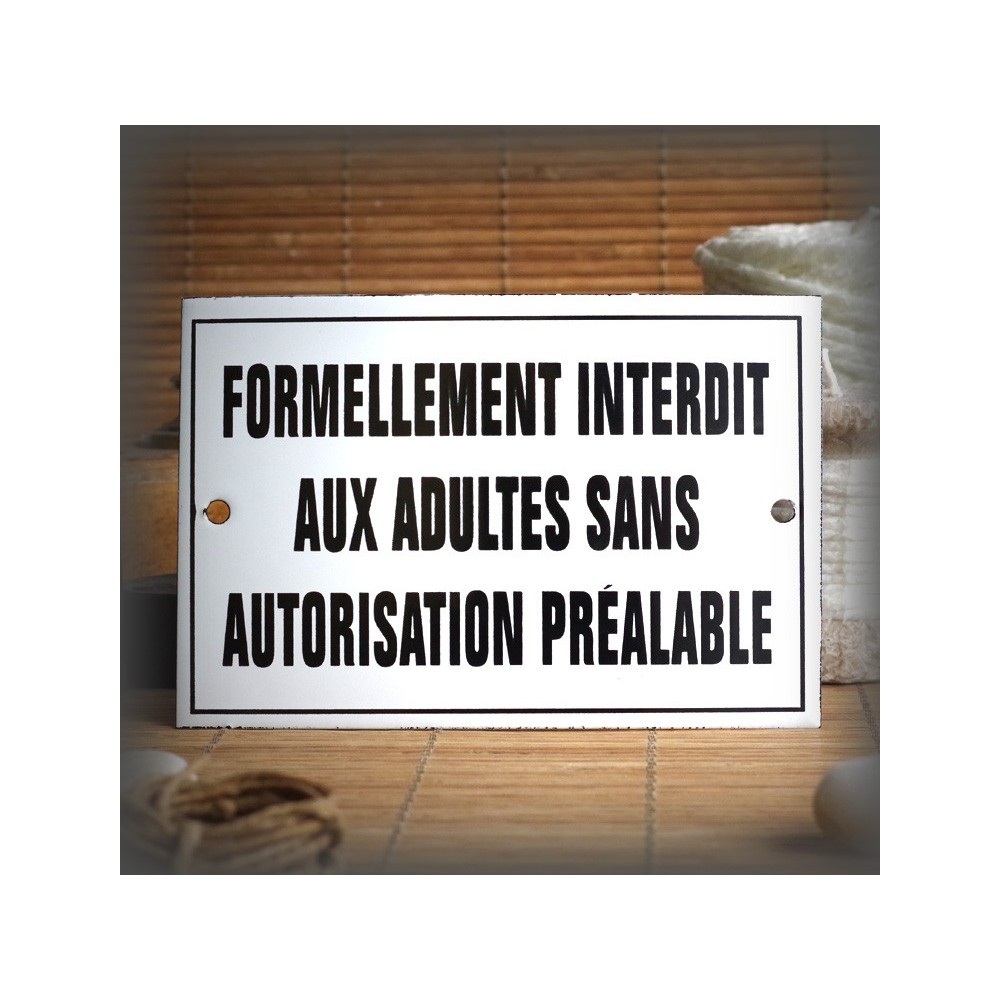 Enamel plate with French text "Interdit aux adultes"